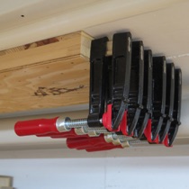 Racks for bar clamps